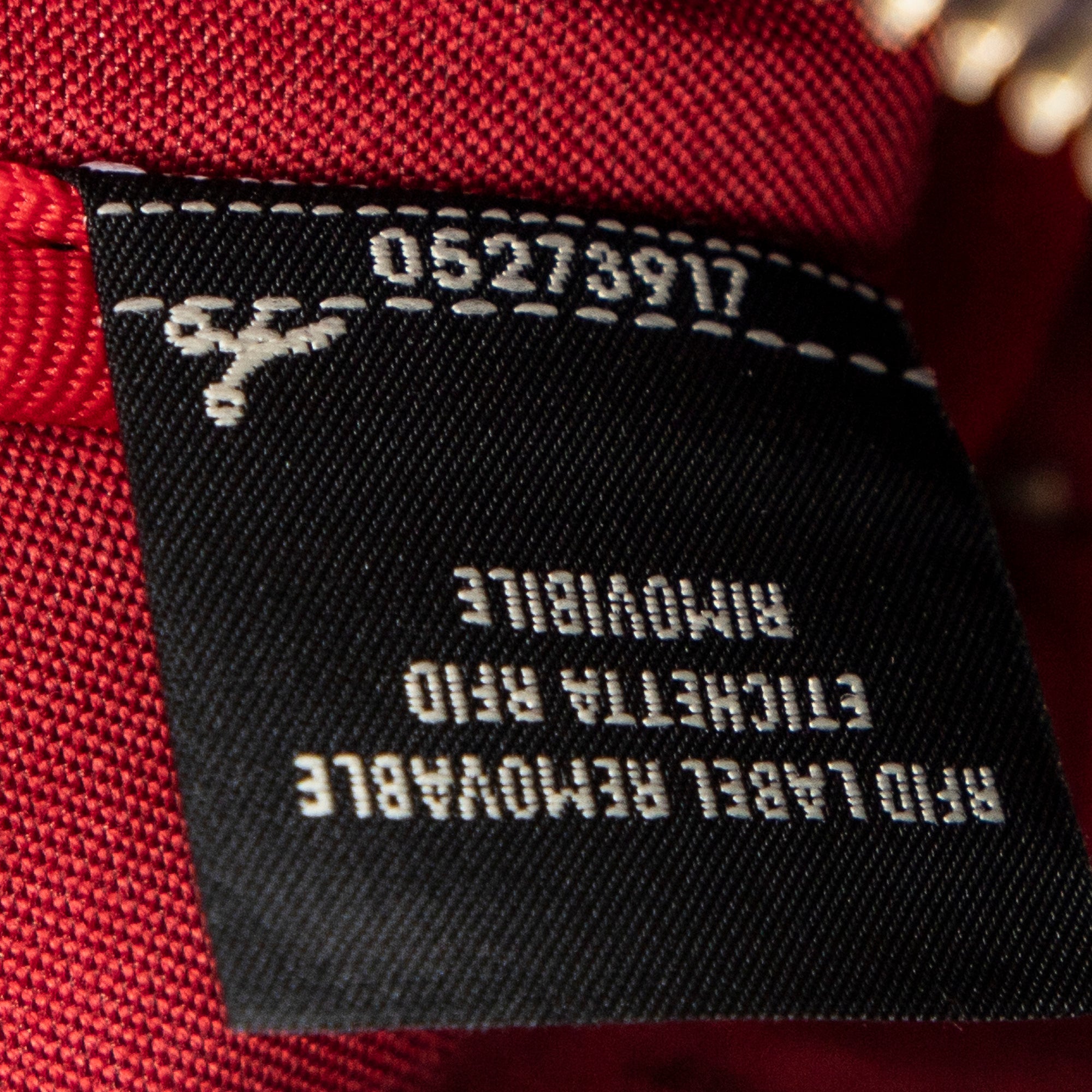 Bolso de mano Fendi x Fila Collab Monedero Zippy Lona recubierta Zucca marrón