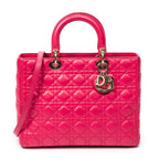 Sac bandoulière grand modèle Lady Dior zippé en cuir d'agneau Cannage fuchsia