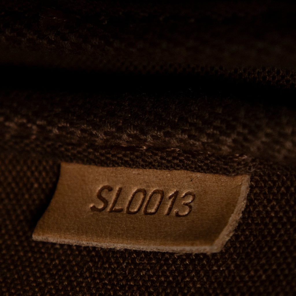Bolso de hombro con accesorio tipo estuche de lona Monogram marrón