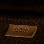 Bolso de hombro con accesorio tipo estuche de lona Monogram marrón