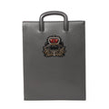 Bolso de mano Trick Track de piel granulada gris con tachuelas