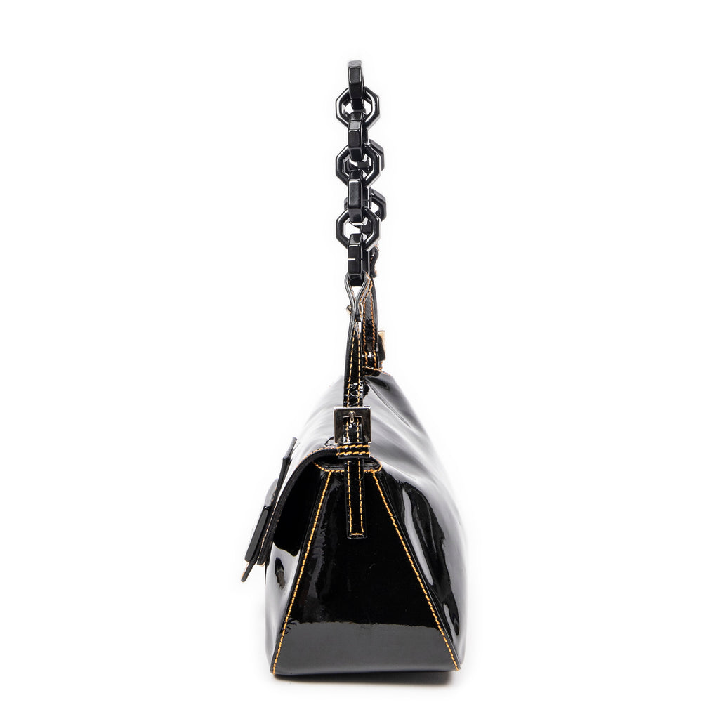 Bolso de hombro mini baguette de piel charol negra
