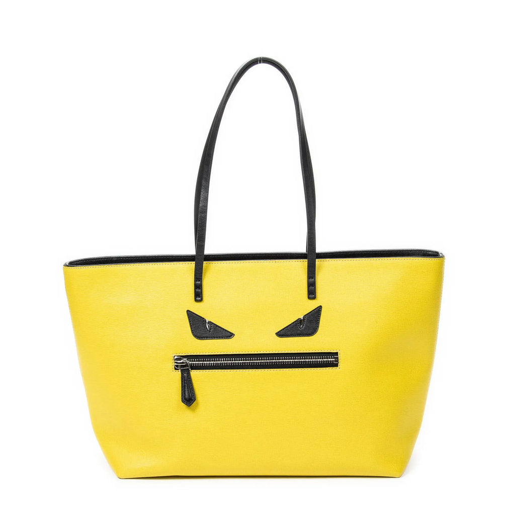 Bolso de hombro con ojos de monstruo, cremallera enrollable, piel texturizada amarilla