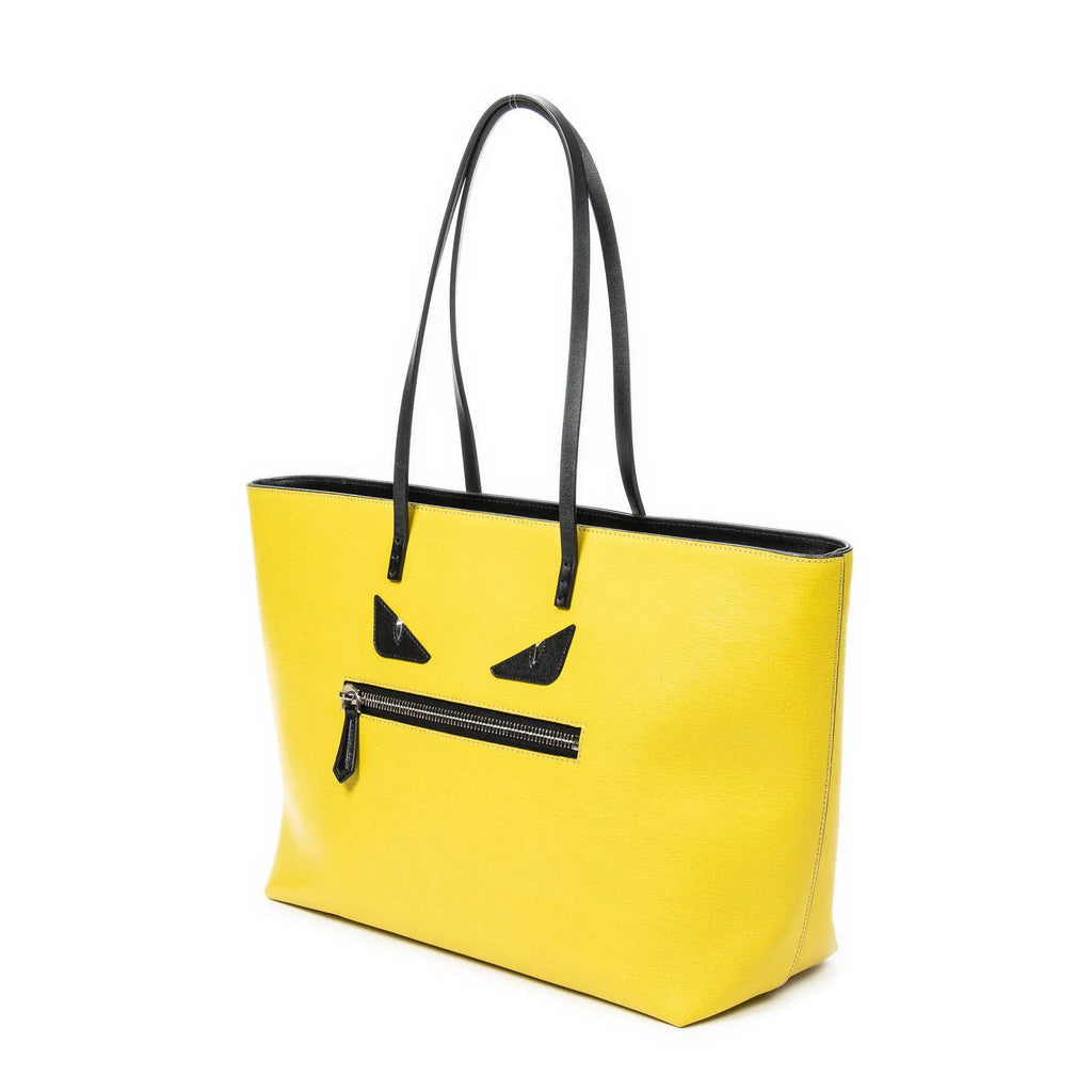 Bolso de hombro con ojos de monstruo, cremallera enrollable, piel texturizada amarilla