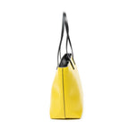 Bolso de hombro con ojos de monstruo, cremallera enrollable, piel texturizada amarilla