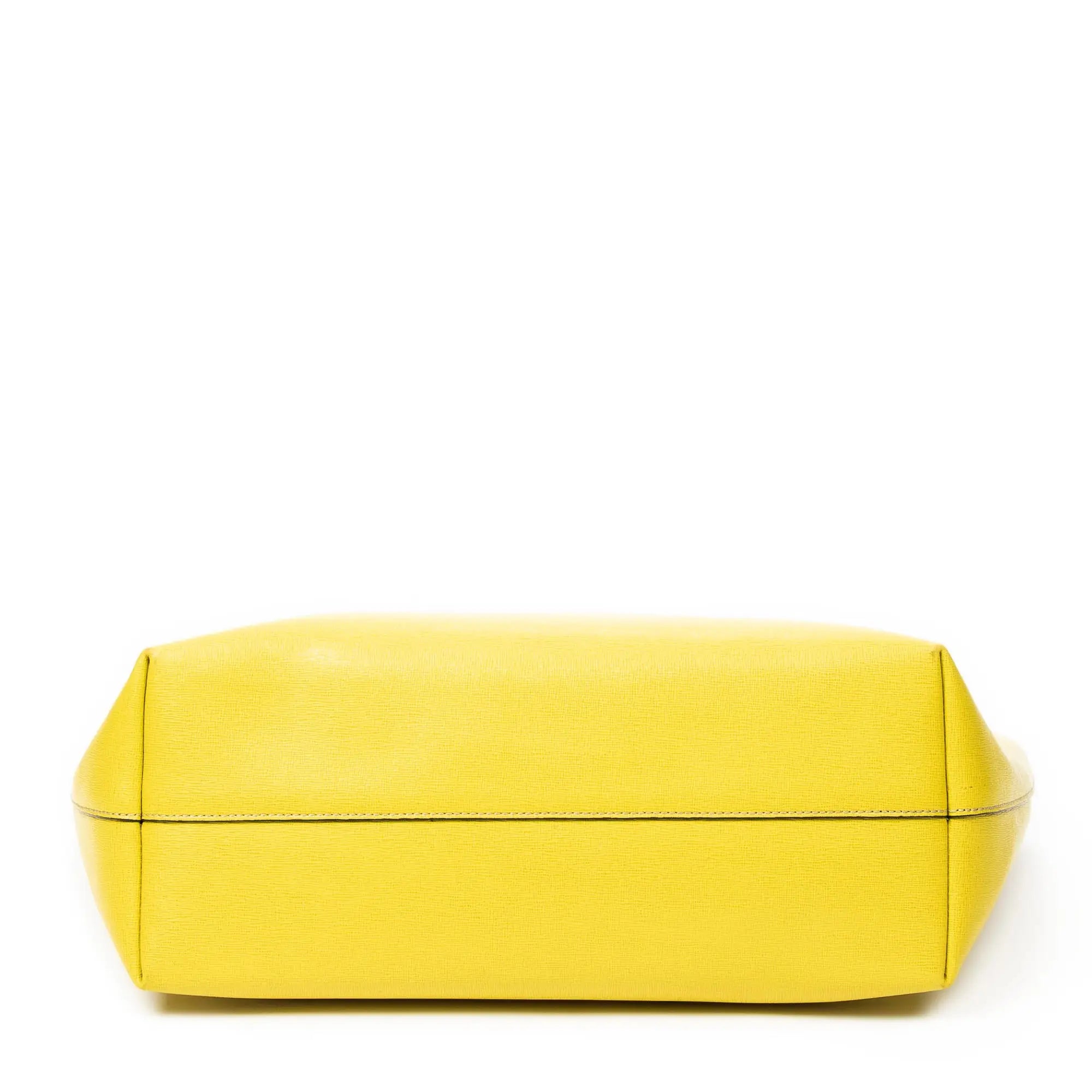 Bolso de hombro con ojos de monstruo, cremallera enrollable, piel texturizada amarilla