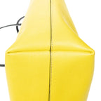 Bolso de hombro con ojos de monstruo, cremallera enrollable, piel texturizada amarilla