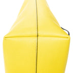 Bolso de hombro con ojos de monstruo, cremallera enrollable, piel texturizada amarilla