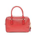 Bolso de mano pequeño con asa superior de piel saffiano roja