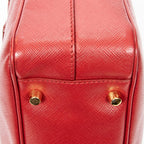Bolso de mano pequeño con asa superior de piel saffiano roja