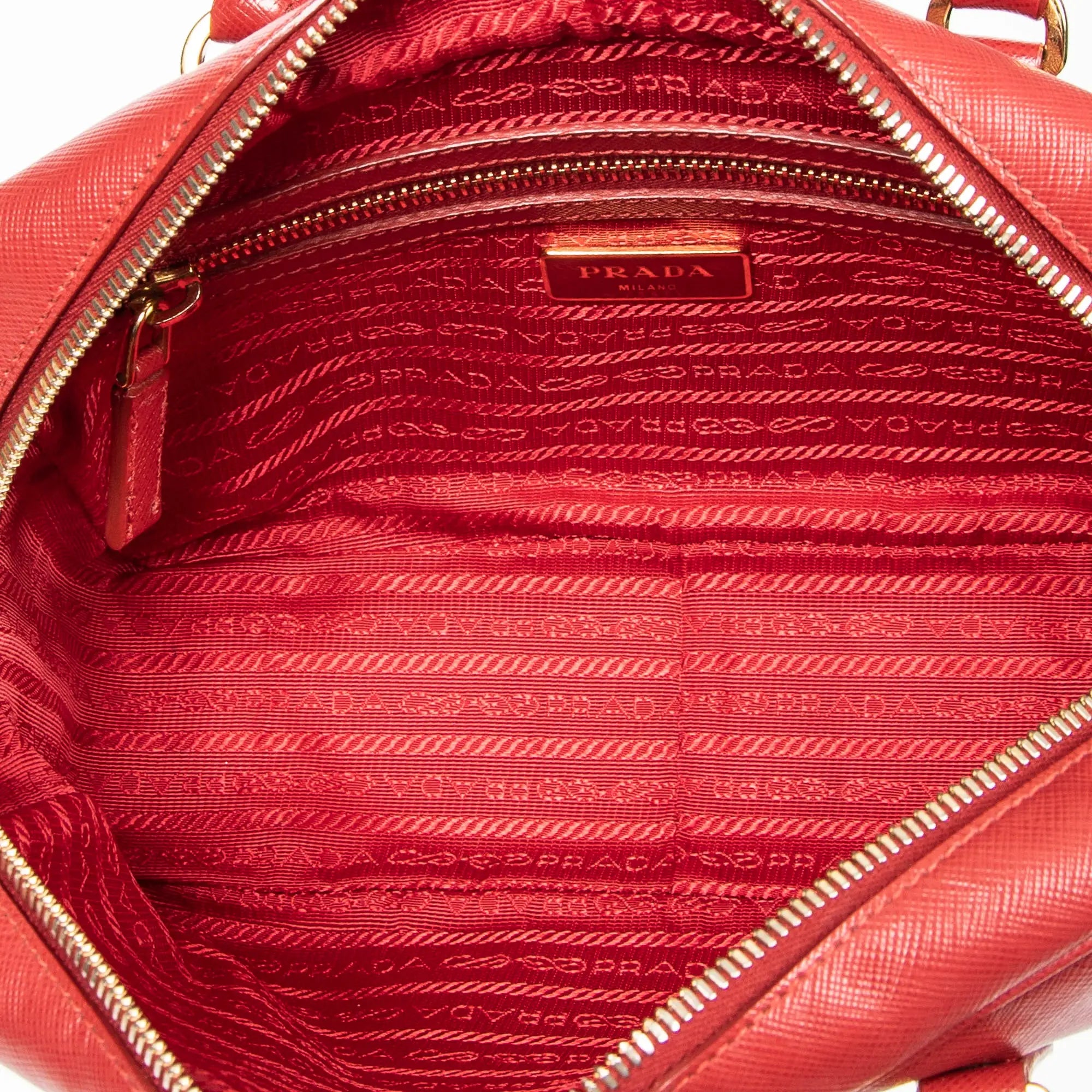 Bolso de mano pequeño con asa superior de piel saffiano roja