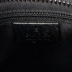 Bolso de hombro con bolsillo frontal abierto y bandolera de lona negra monograma