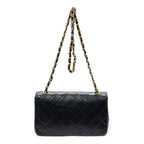 Sac à bandoulière Mademoiselle Full Flap en cuir d'agneau matelassé noir