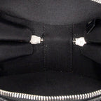 Bolso de hombro CC redondo de piel charol con purpurina negra y cadena cruzada