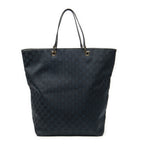 Bolso de mano grande vertical abierto de lona negra con monograma