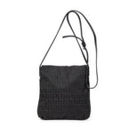 Bolso de hombro con solapa pequeña y bandolera de lona Zucchino negra