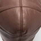 Bolso de hombro Soho con cadena, borla y piel de becerro granulada beige