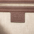 Bolso de hombro Soho con cadena, borla y piel de becerro granulada beige