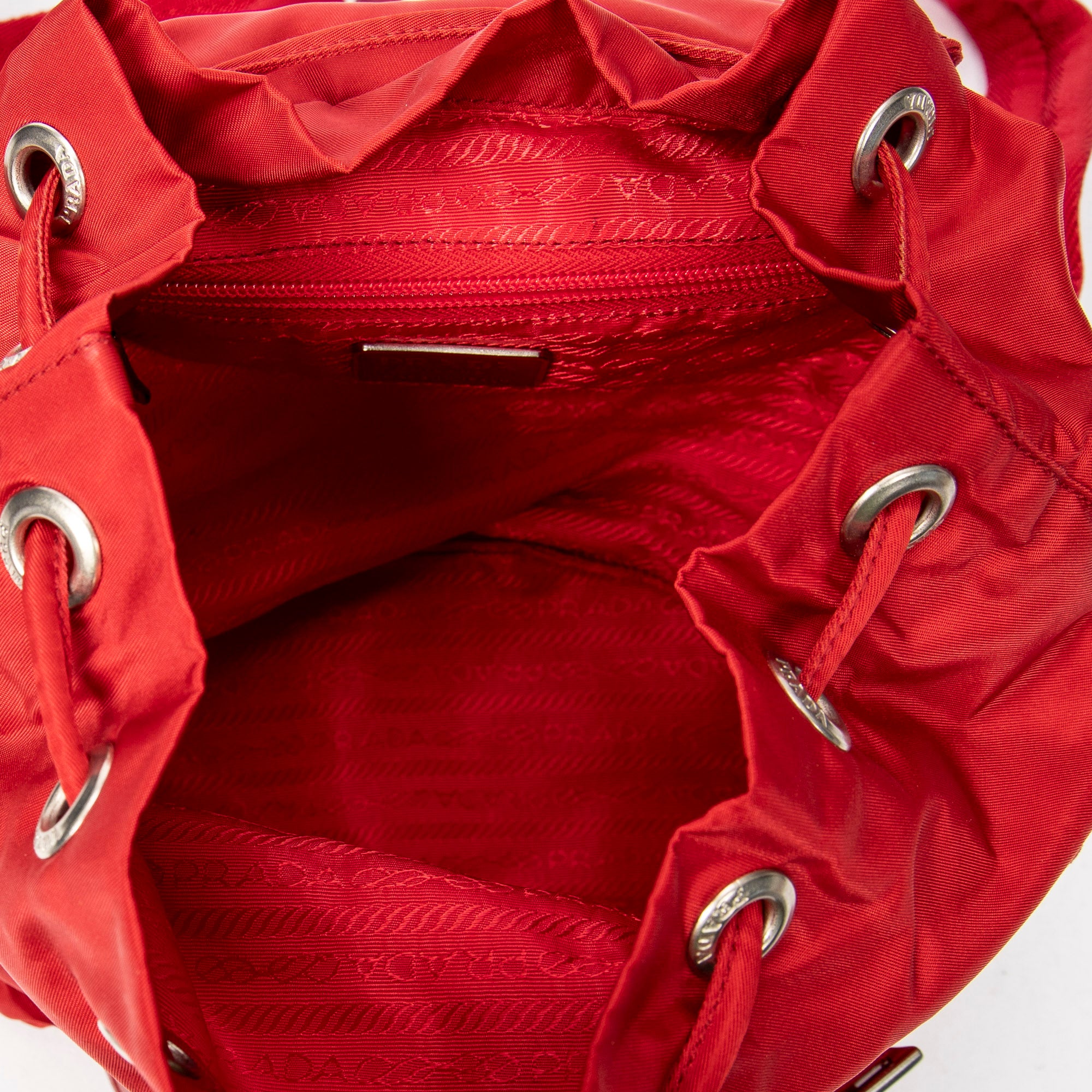 Mochila pequeña con cordón, de nailon y lona, color rojo