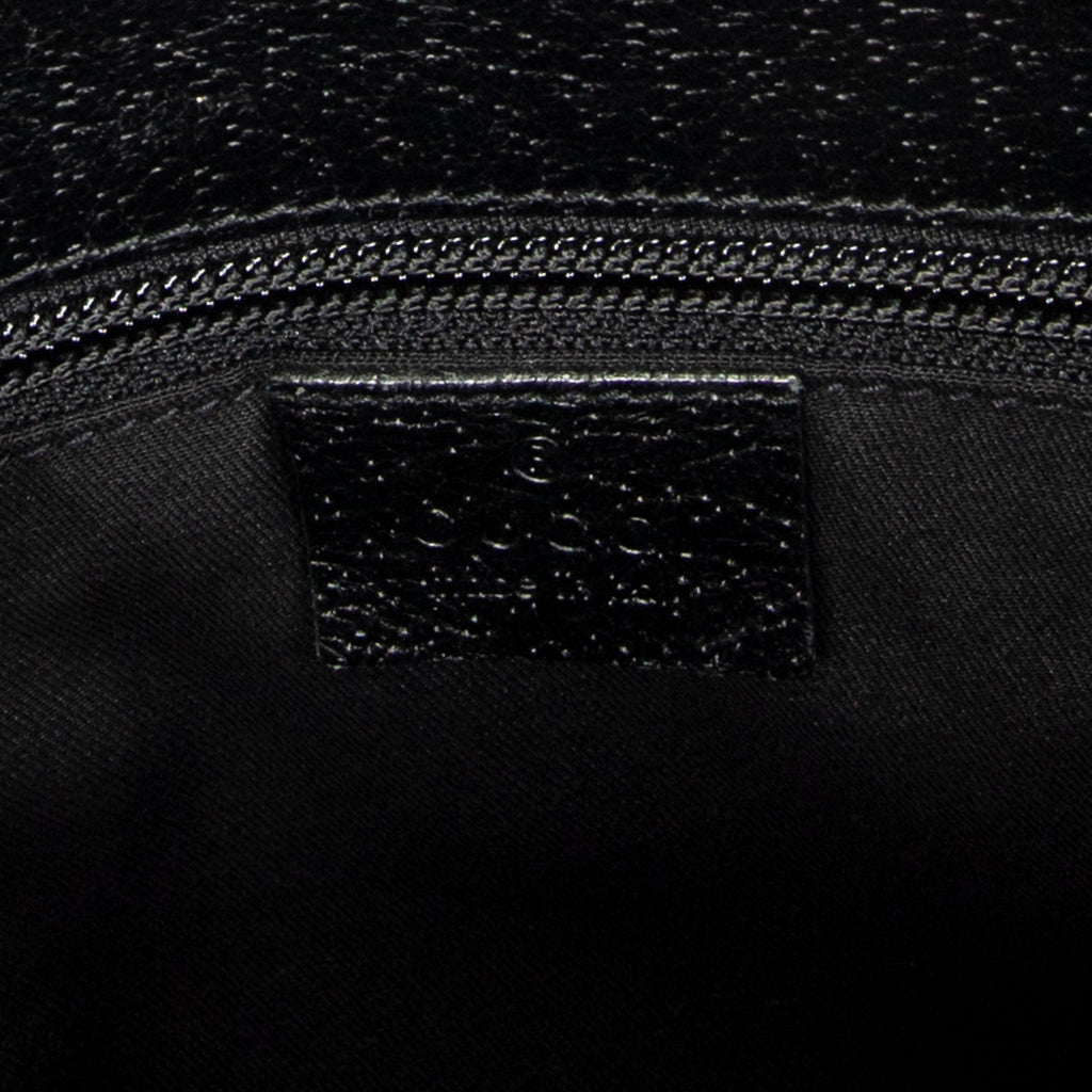 Bolso de Hombro Joy Messenger Lona Monogram con estampado "Joy" negra