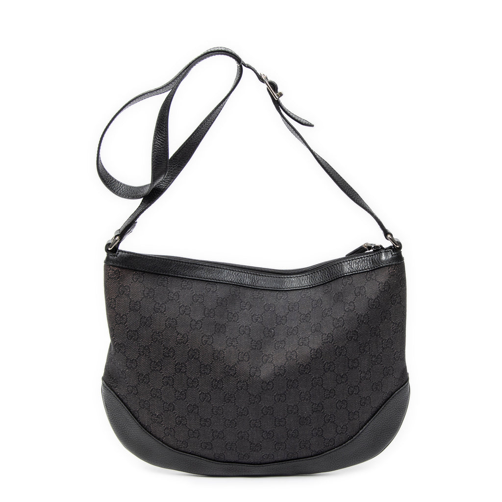 Bolso de hombro Messenger de media luna de lona vaquera negra con monograma