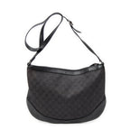 Bolso de hombro Messenger de media luna de lona vaquera negra con monograma