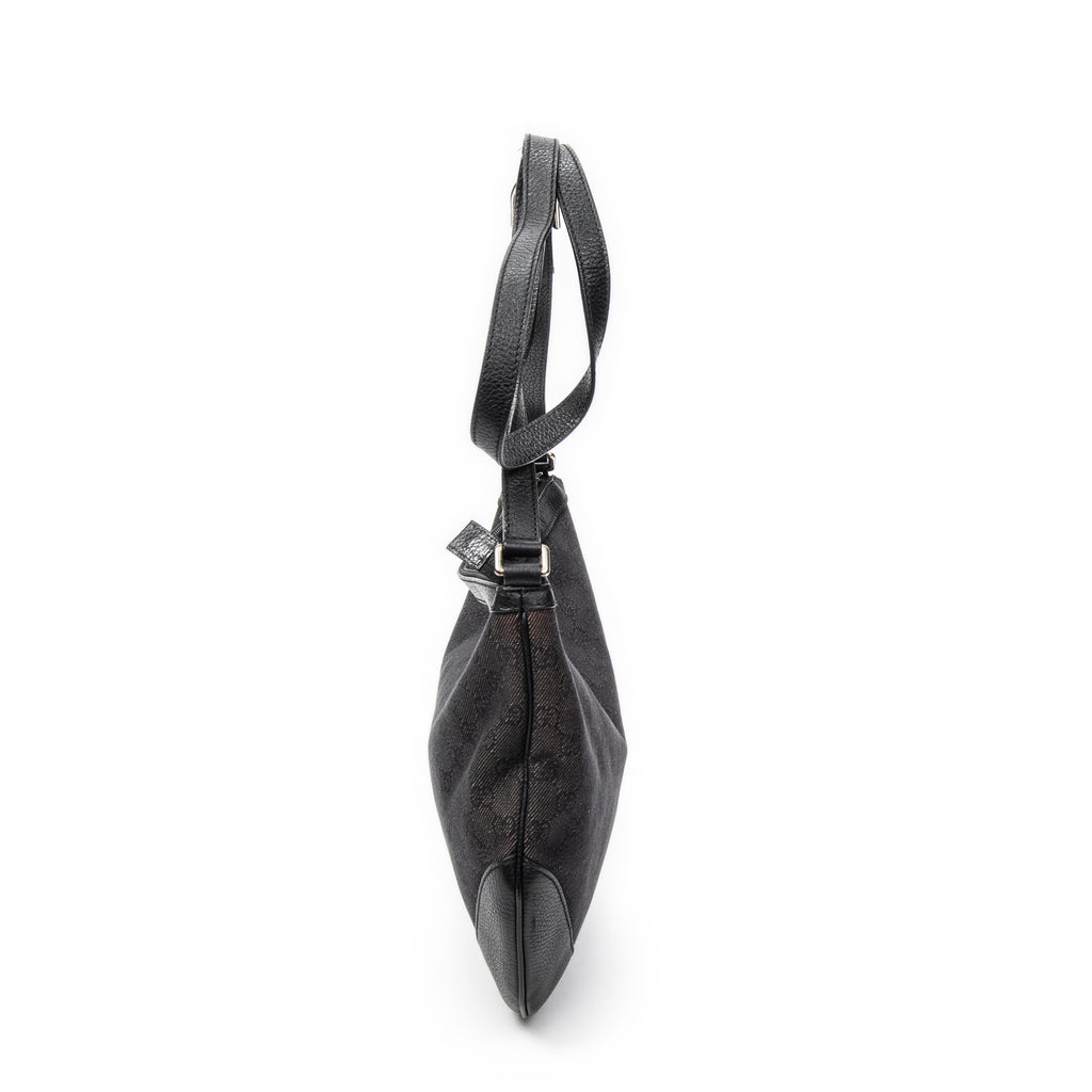 Bolso de hombro Messenger de media luna de lona vaquera negra con monograma