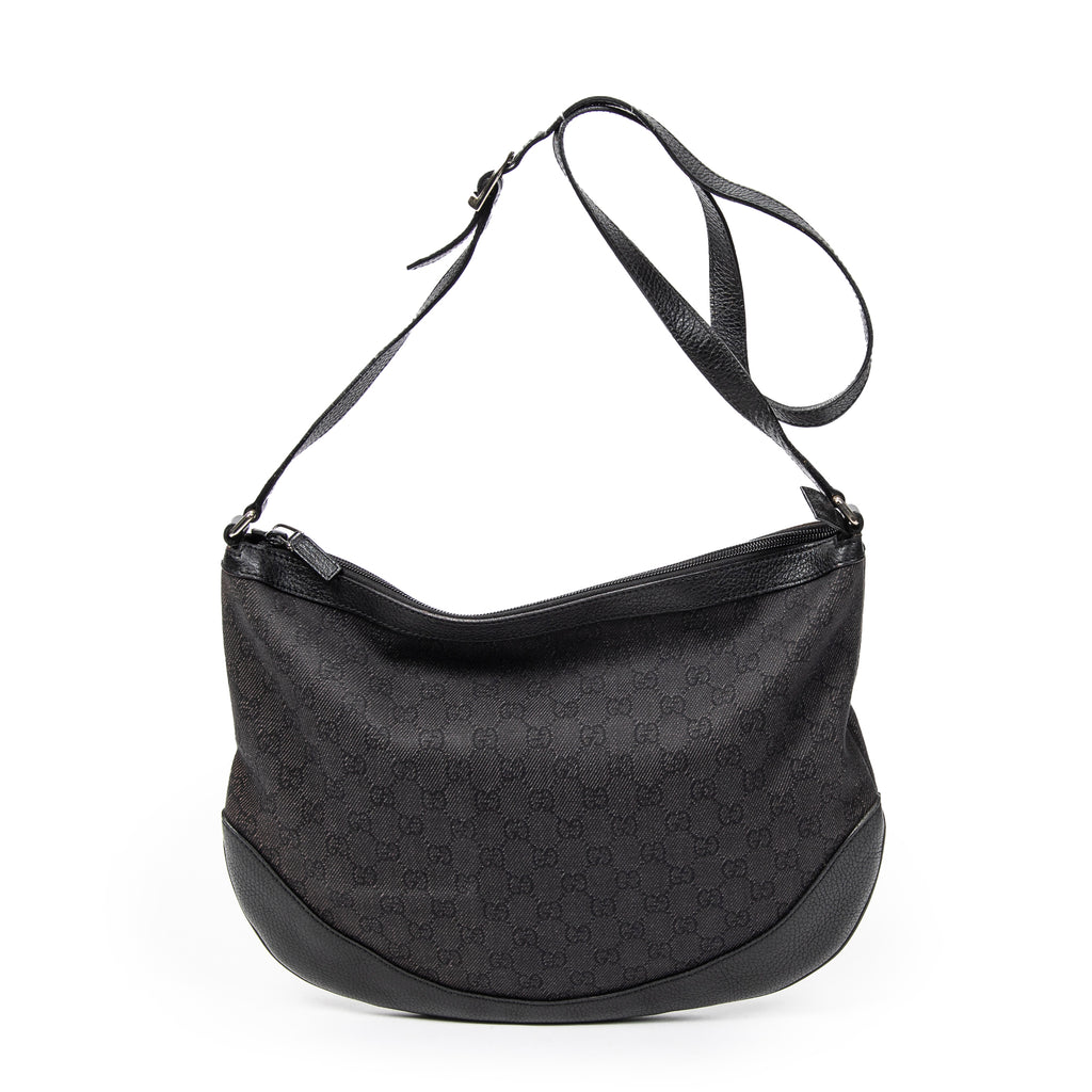 Bolso de hombro Messenger de media luna de lona vaquera negra con monograma