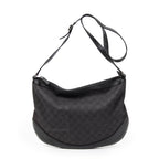 Bolso de hombro Messenger de media luna de lona vaquera negra con monograma