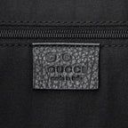 Bolso de hombro Messenger de media luna de lona vaquera negra con monograma