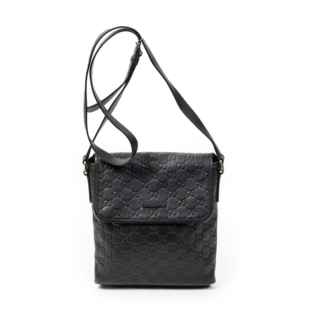 Sac bandoulière petit format avec rabat en cuir Guccissima noir