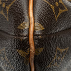 Bolso de hombro Musette de lona Monogram marrón