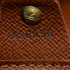 Bolso de hombro Musette de lona Monogram marrón