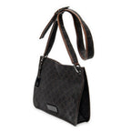 Bolso de hombro pequeño tipo bandolera de lona vaquera con monograma marrón oscuro