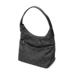 Sac bandoulière toile de nylon noire monogrammée à poche frontale type hobo