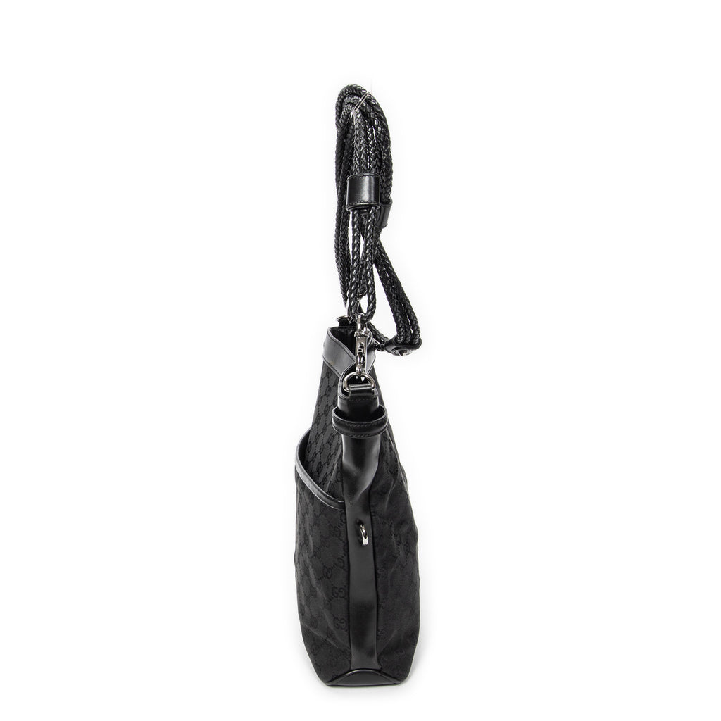Bandolera con correa trenzada en lona monogramada negra