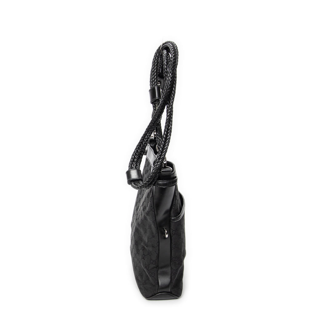 Bandolera con correa trenzada en lona monogramada negra