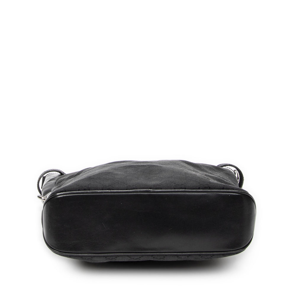 Bandolera con correa trenzada en lona monogramada negra