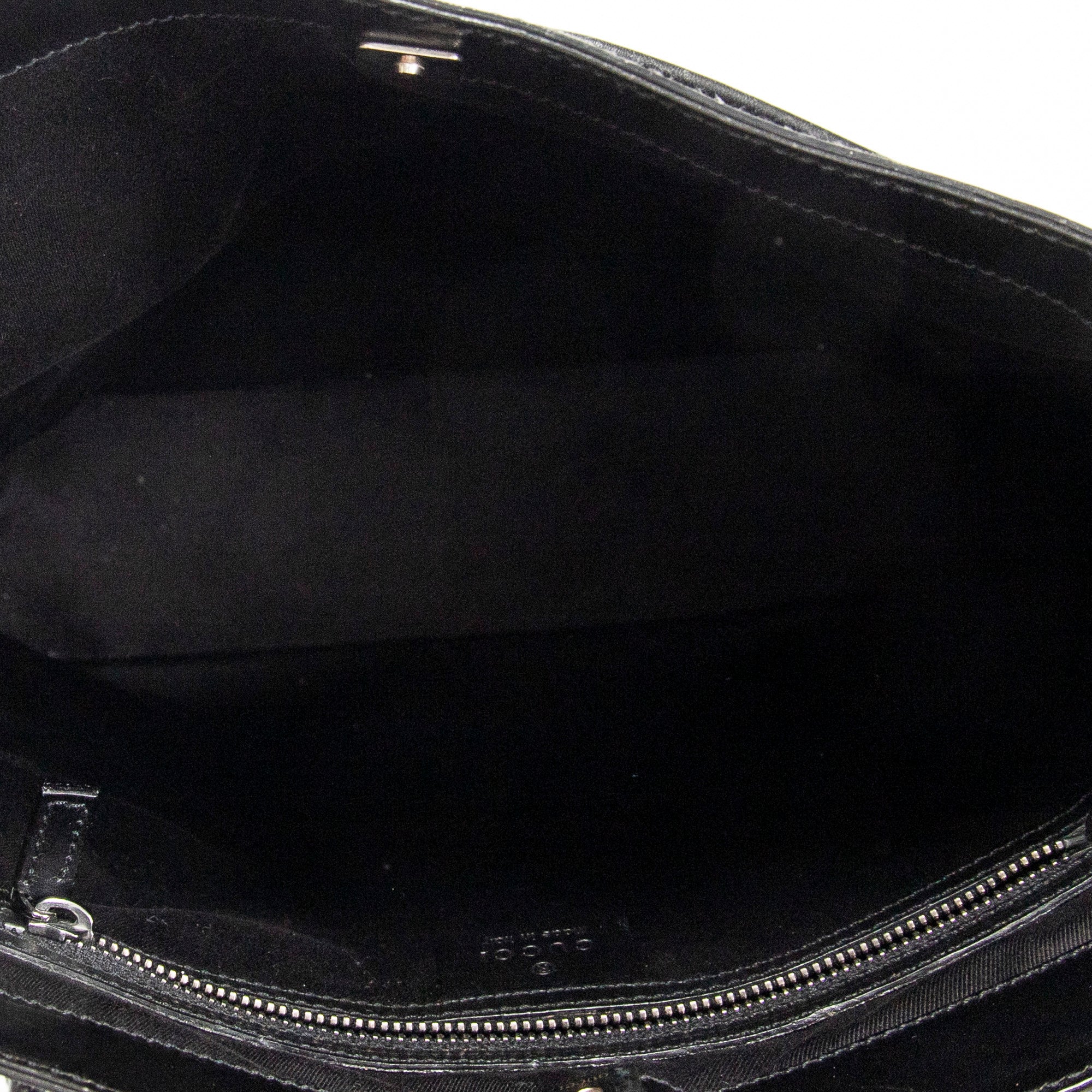 Bandolera con correa trenzada en lona monogramada negra