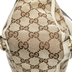 Bolso de hombro mediano Abbey Tote con anilla en D y monograma de lona en color marfil