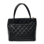 Bolso de hombro Timeless Medallion Tote de cuero caviar acolchado negro
