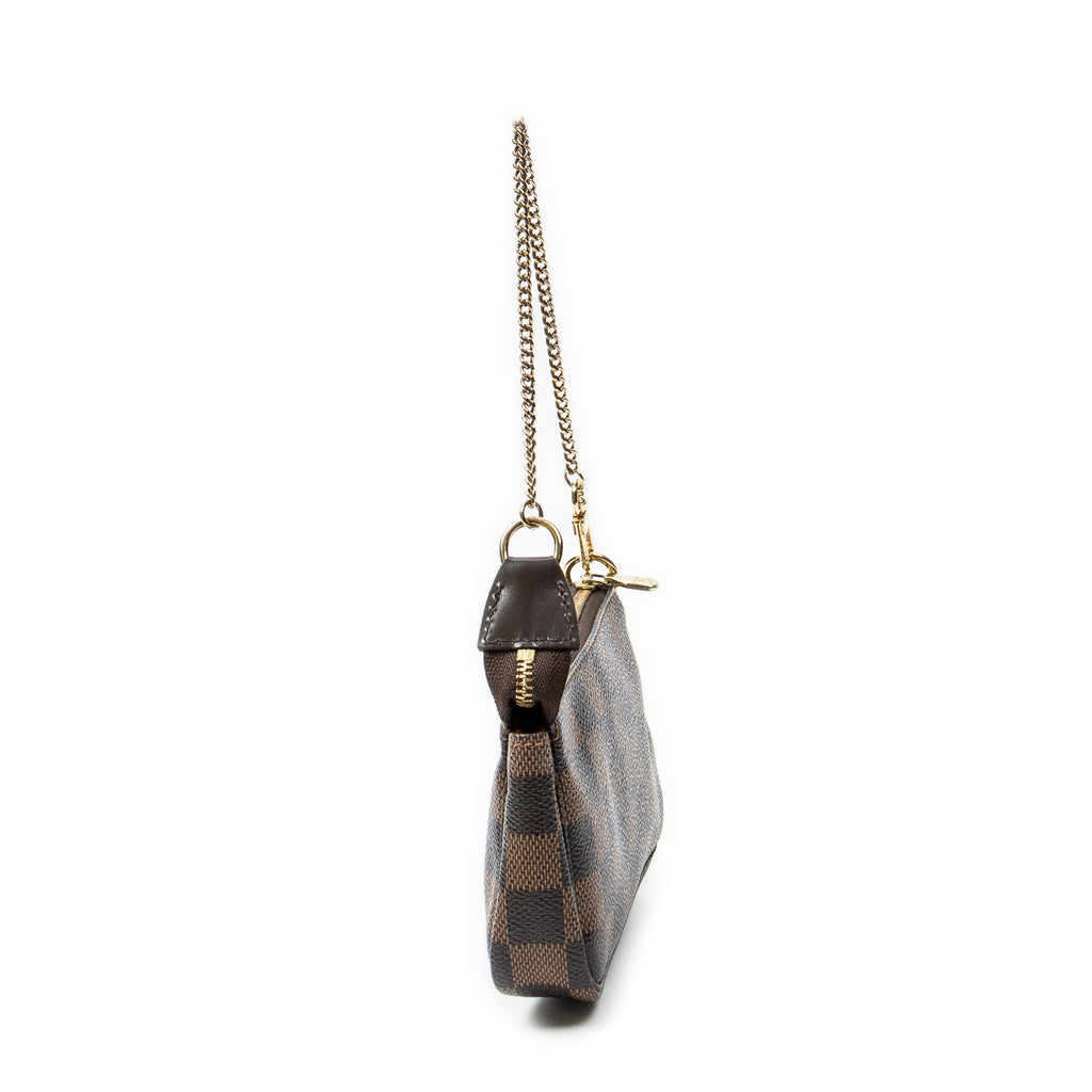 Minibolsa Pochette Accessoires Damier Ebene Complice Marrón