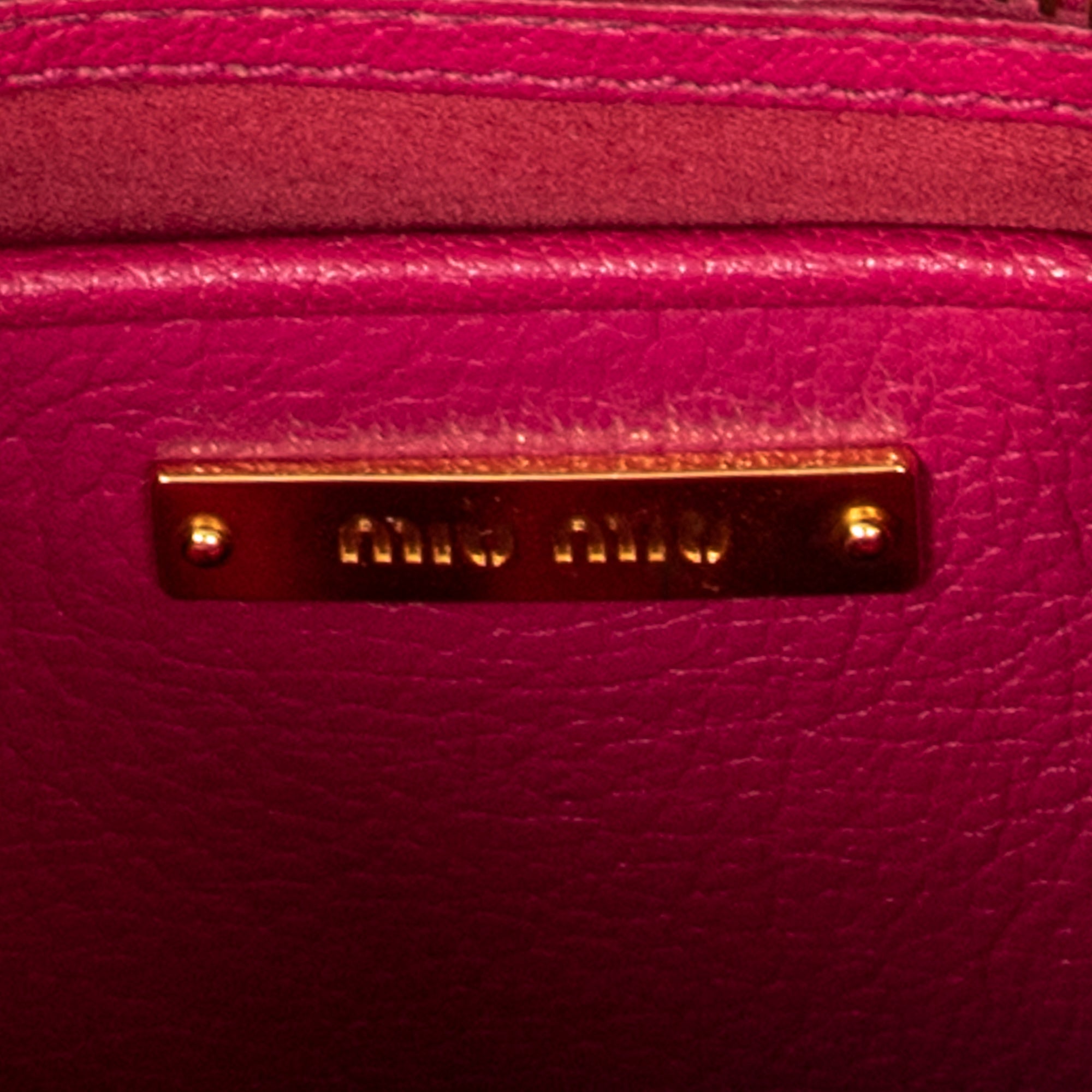 Sac à bandoulière Executive en cuir Madras rose fuchsia avec fermoir poussoir
