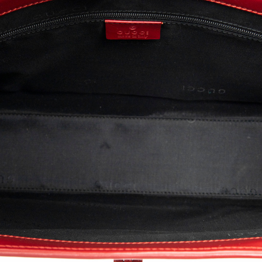 Bolso de hombro cuadrado Jackie Tote lona roja con monograma