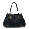 Sac à bandoulière moyen Cabas Princy Web en toile noire monogrammée