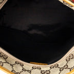 Bolso de hombro con cremallera en el bolsillo delantero, de lona beige con monograma