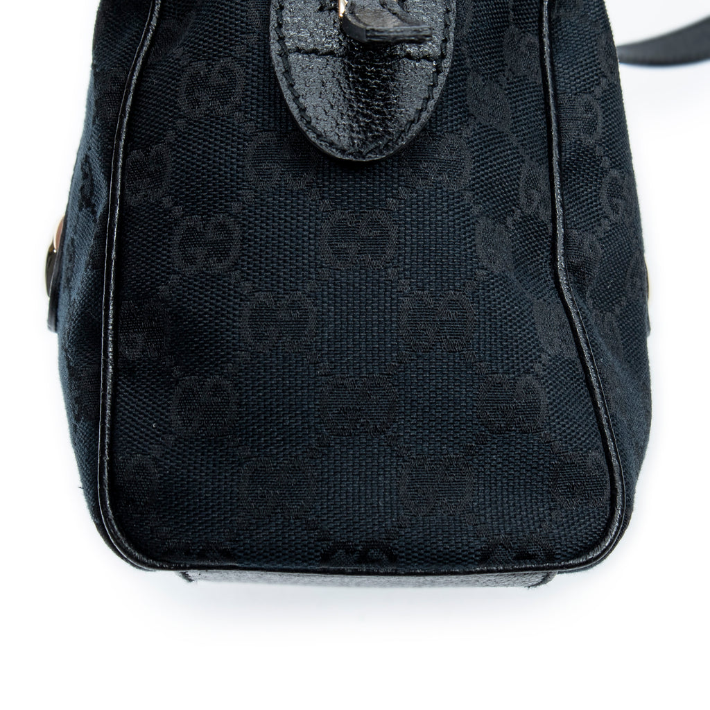 Sac bandoulière Charmy Boston en toile monogrammée noire
