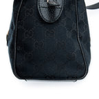 Sac bandoulière Charmy Boston en toile monogrammée noire