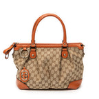 Sac à bandoulière Sukey à anse supérieure en toile monogrammée orange