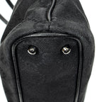 Bolso de hombro horizontal de lona jacquard negra con monograma